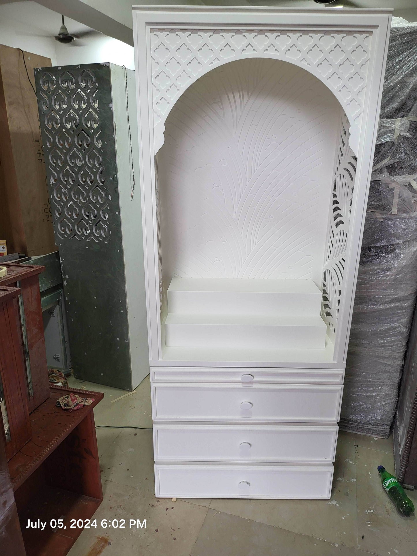 Corian Mandir design for home Banaleaf leaf jaali pattern - Home temple