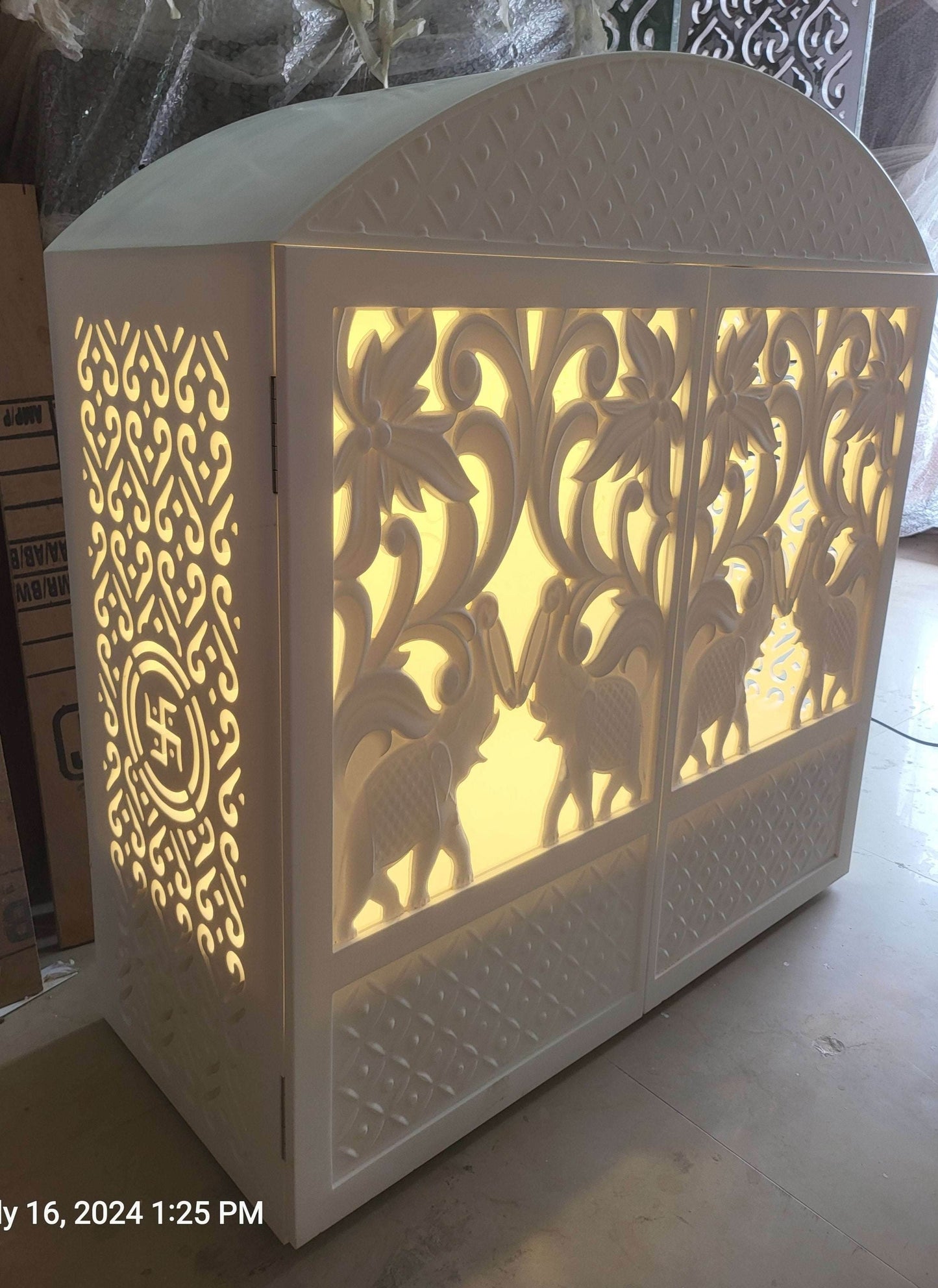 Corian mandir compact design with carving doors and rounded top - Home temple
