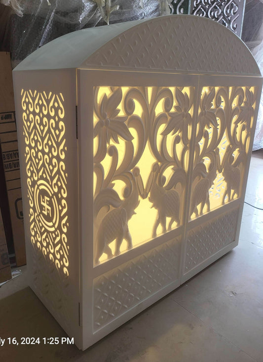 Corian mandir compact design with carving doors and rounded top - Home temple