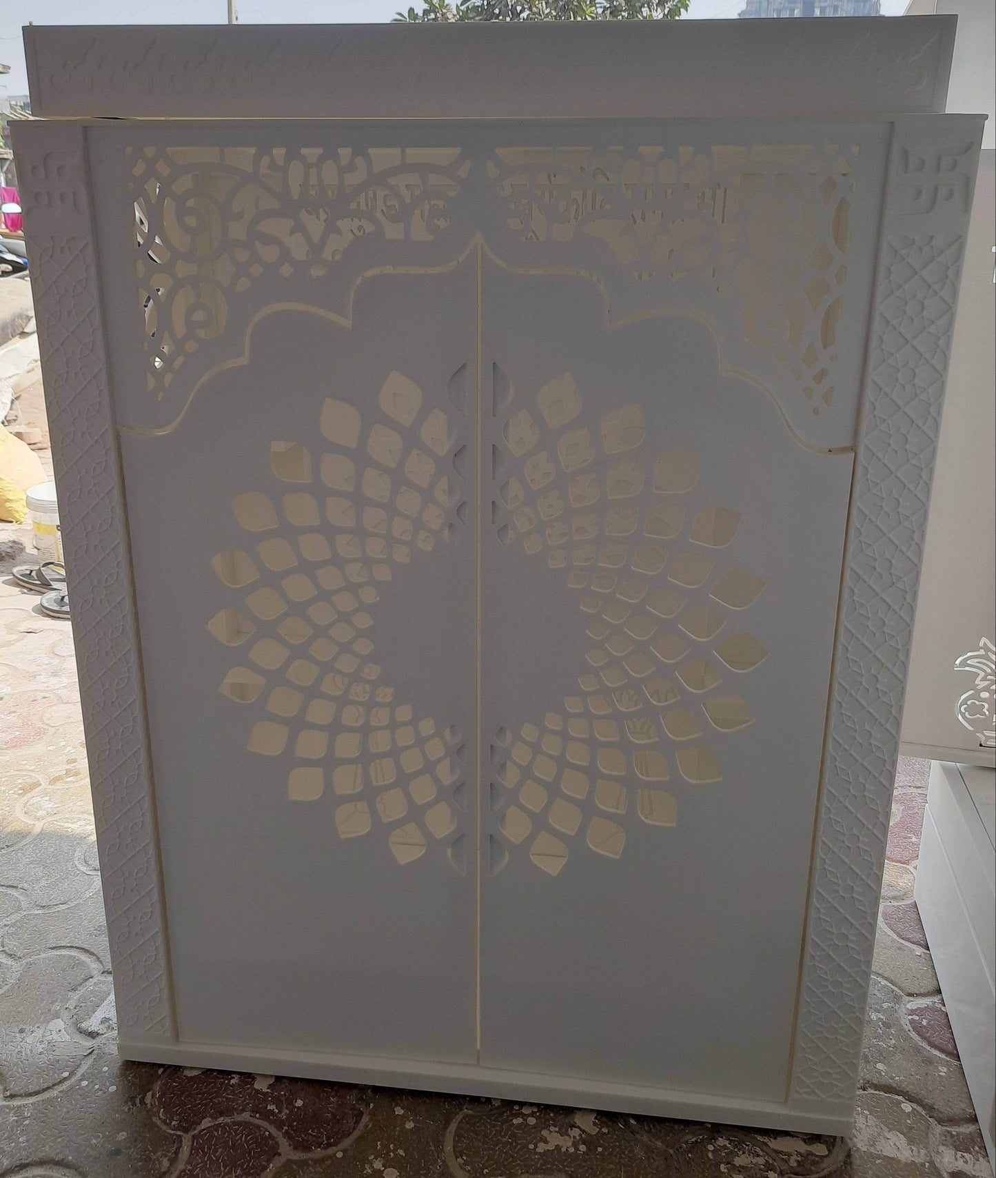 Corian Mandir with doors and ganesha side jhaali - Home temple