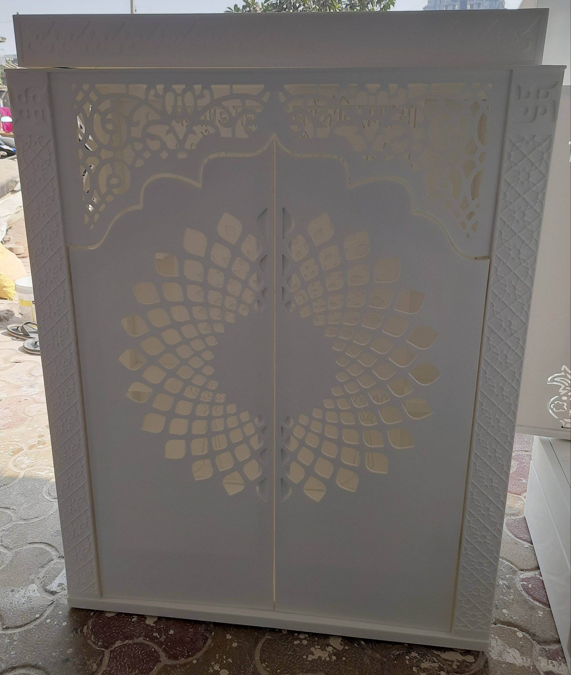 Corian Mandir with doors and ganesha side jhaali - Home temple