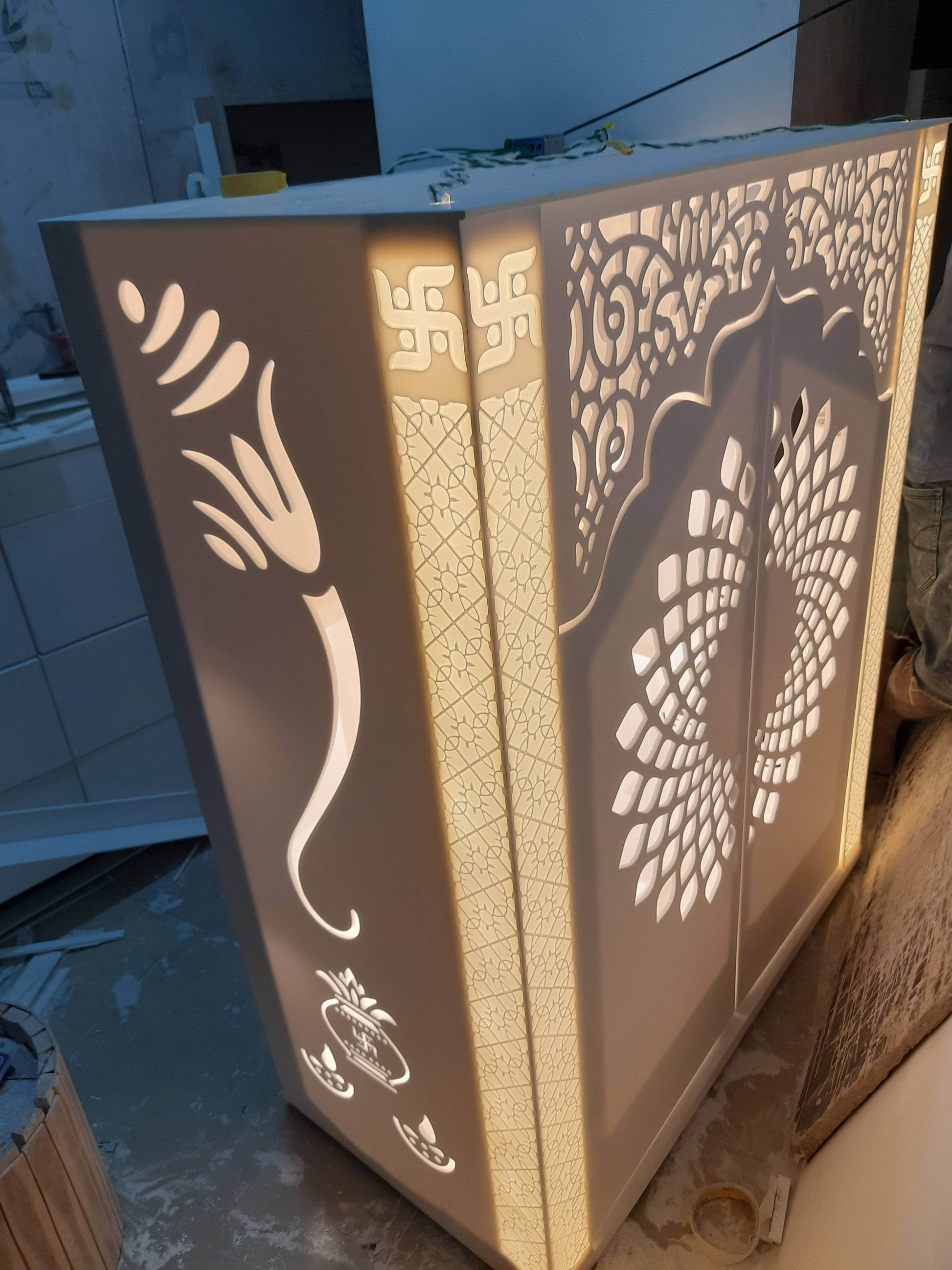 Corian Mandir with doors and ganesha side jhaali - Home temple