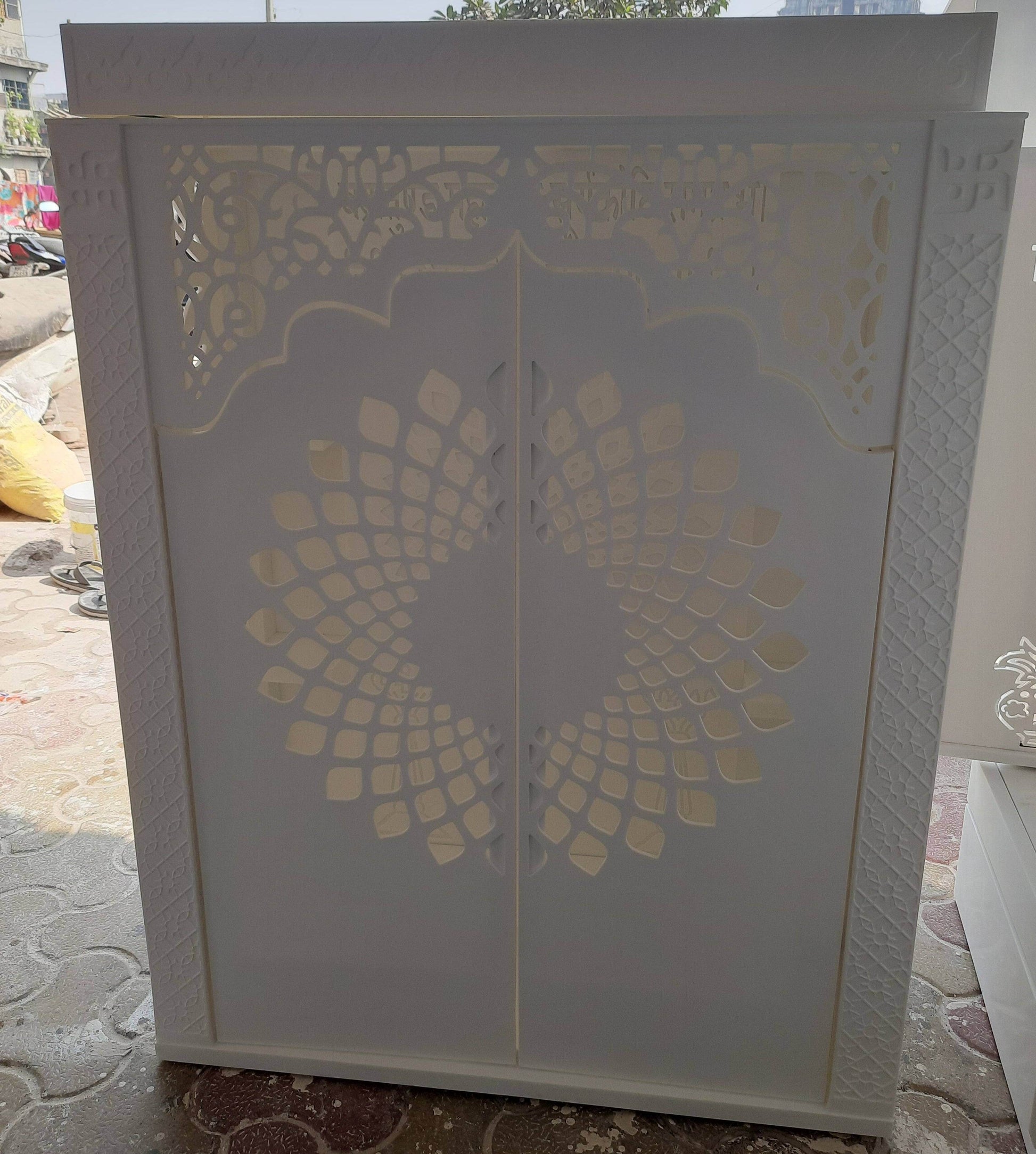 Corian Mandir with doors and ganesha side jhaali - Home temple