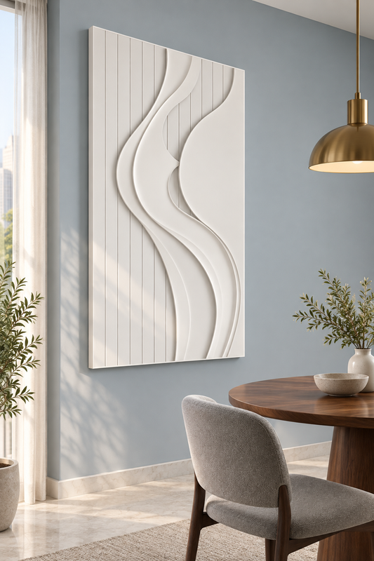 Twin Ribbon Cadence satin white Corian wall panel, left view in a dusty-blue Mumbai dining area with a round walnut table.