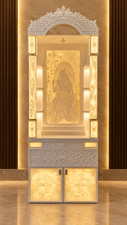 Radha Krishna 3D panel Corian mandir with two illuminated peacock-feather pillars and ornate crown in a digitally styled luxury interior