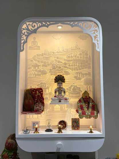 Compact Jain Corian mandir with illuminated 3D Shatrunjay path backdrop, owner-supplied photograph