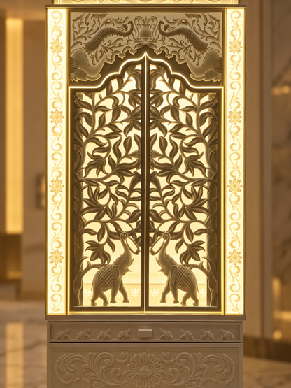 Detail view of the backlit Corian mandir doors with leafy jali pattern and mirrored elephant motifs