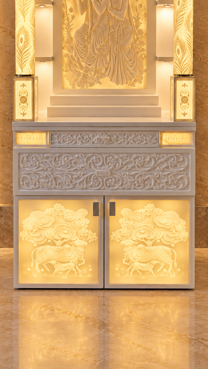 Digitally styled lower detail of Radha Krishna Corian mandir showing stepped altar, ornamental fascia and illuminated double-door storage