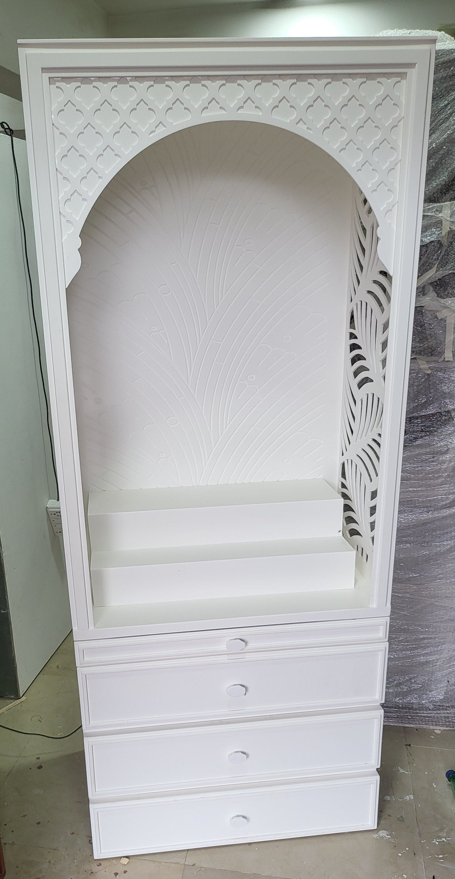 Corian Mandir design for  home Banaleaf leaf jaali pattern corian mandir mumbai