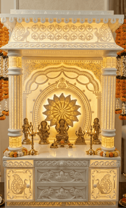 3d designer corian Mandir with intricate BACKLIT DRAWER 3D carvings and ROUND 3D PILLARS WITH DESIGNER ARTWORK