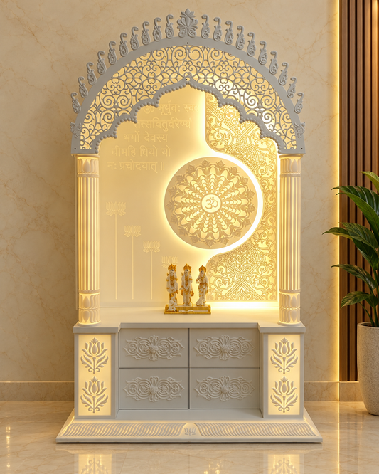 Arched Corian mandir with warm backlighting, a circular Om mandala, fluted pillars and illuminated floral panels at the base