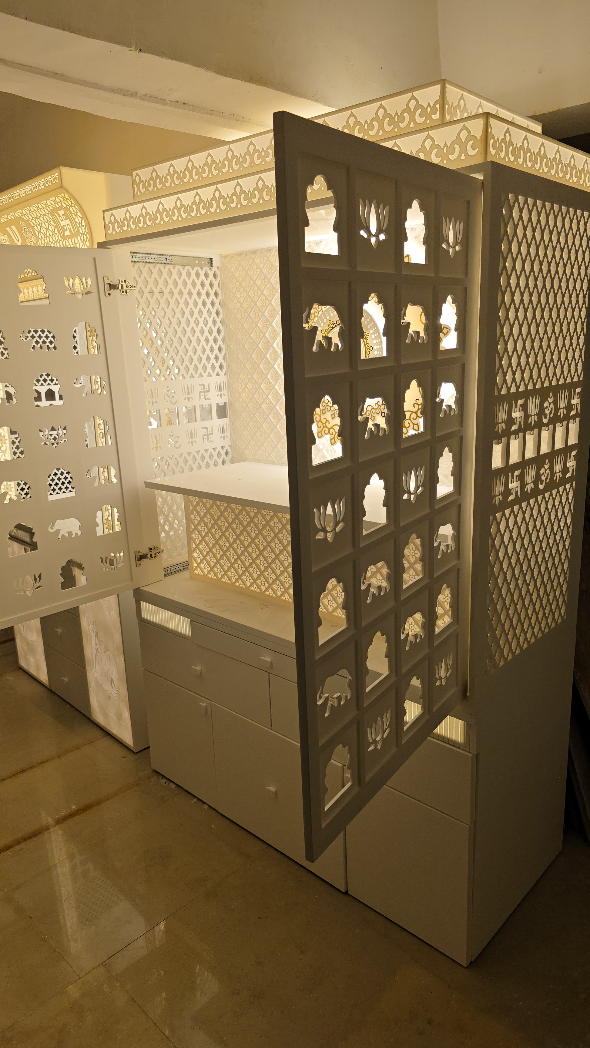 Corian pooja mandir with space saving 3d beautiful backlit door that slides in solid carving rare pattern 