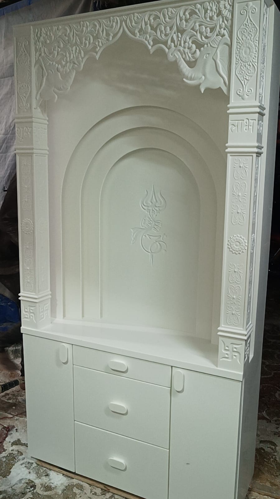 Corian temple with 3 layers and trishul