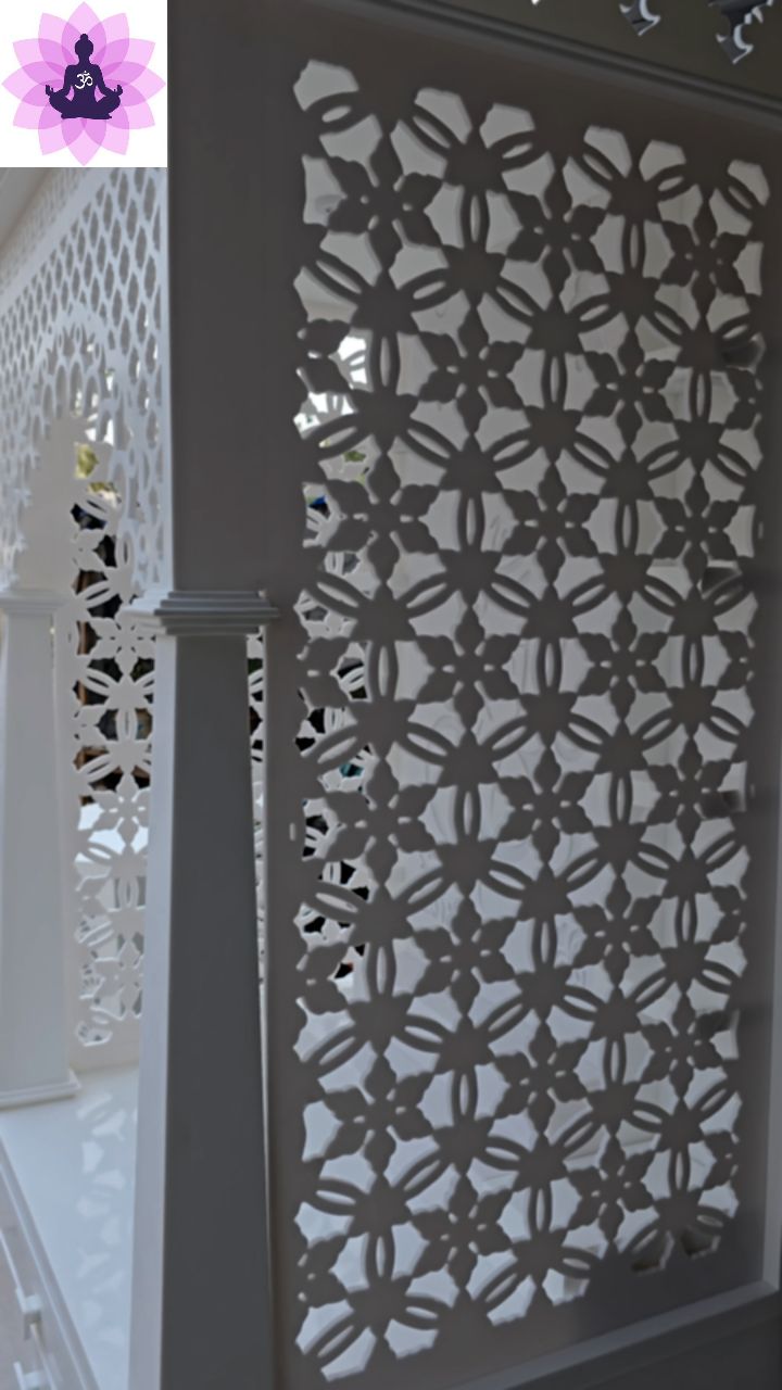 Premium corian mandir with traditional handmade pillars tappered and fine jaali work 