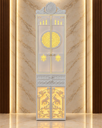 Compact Jain mandir with closed illuminated mandala doors, 21 inches wide and 84 inches high.
