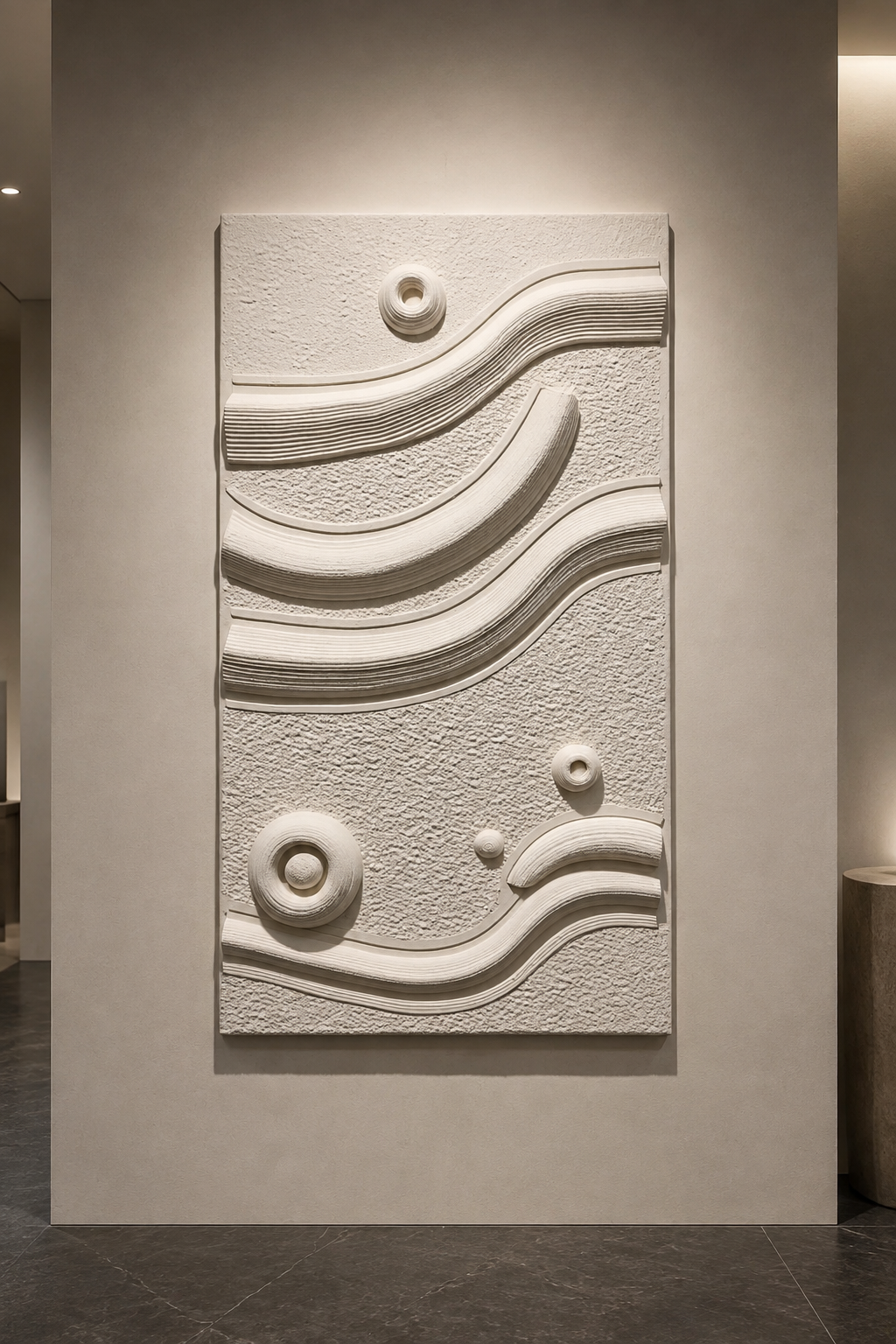 Orbit Tide Relief satin white Corian wall panel, front view in a minimalist South Mumbai gallery
