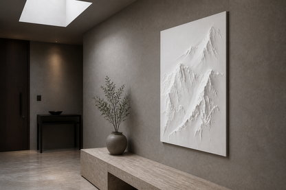 Summit Relief white Corian wall panel right angle in contemporary Mumbai foyer with cool stone-grey wall and travertine console