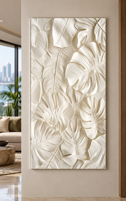 Front view: large tropical split leaves, sculptural botanical relief in a satin white Corian wall panel.