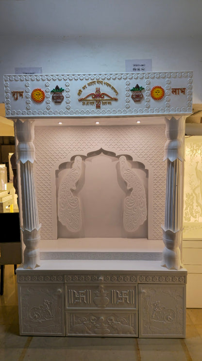 Original front photograph showing the peacock relief and 24-inch carved storage without backlighting