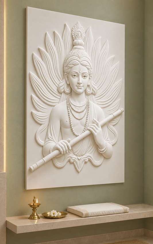Krishna Flute Feather Aureole satin white Corian wall panel, left view in a muted sage Mumbai prayer alcove with a pale stone shelf.