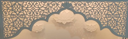 Exact floral arch and lotus detail cropped from the original front product photograph; no AI redraw.