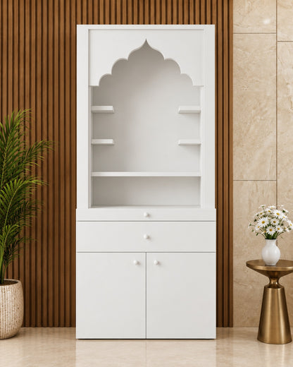 Front view of the minimalist white Corian mandir with arch, side shelves and storage, in a wood-and-stone interior. Styled visualization.