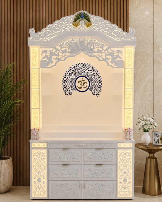 Premium white Corian mandir 4 ft wide with warm backlit pillars, Om peacock-feather inlay and vertical storage