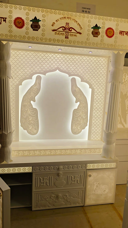 Traditional Corian pillars and peacock jali arch front elevation
