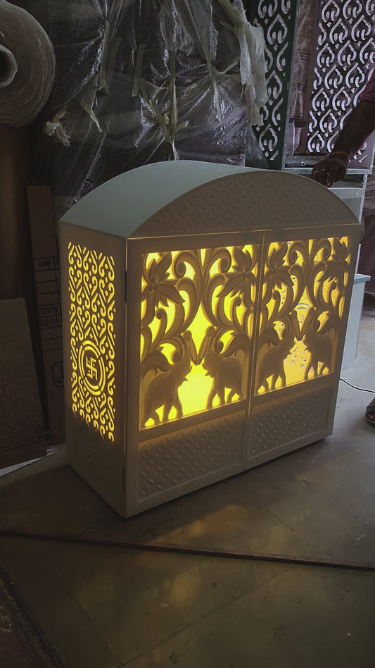 Corian mandir compact design with carving doors and rounded top