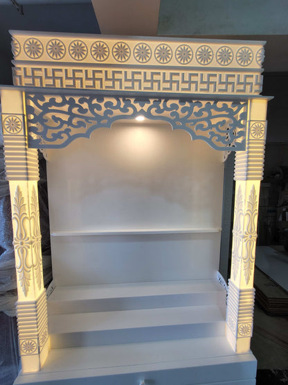 Corian mandir for home with pillars and laminated cabinet storage corian mandir mumbai
