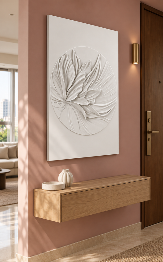 Swept Petal Medallion Corian wall panel, left view in a Mumbai entrance foyer with a dusty rose wall and floating oak console.