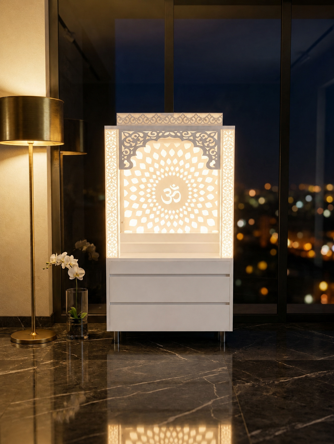 Front night view of white Corian Om mandir with two handleless storage drawers